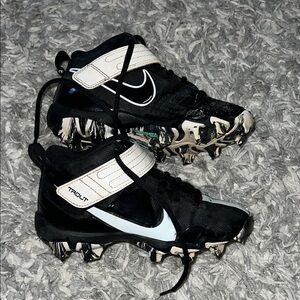 Nike Black and White Cleats with Swoosh